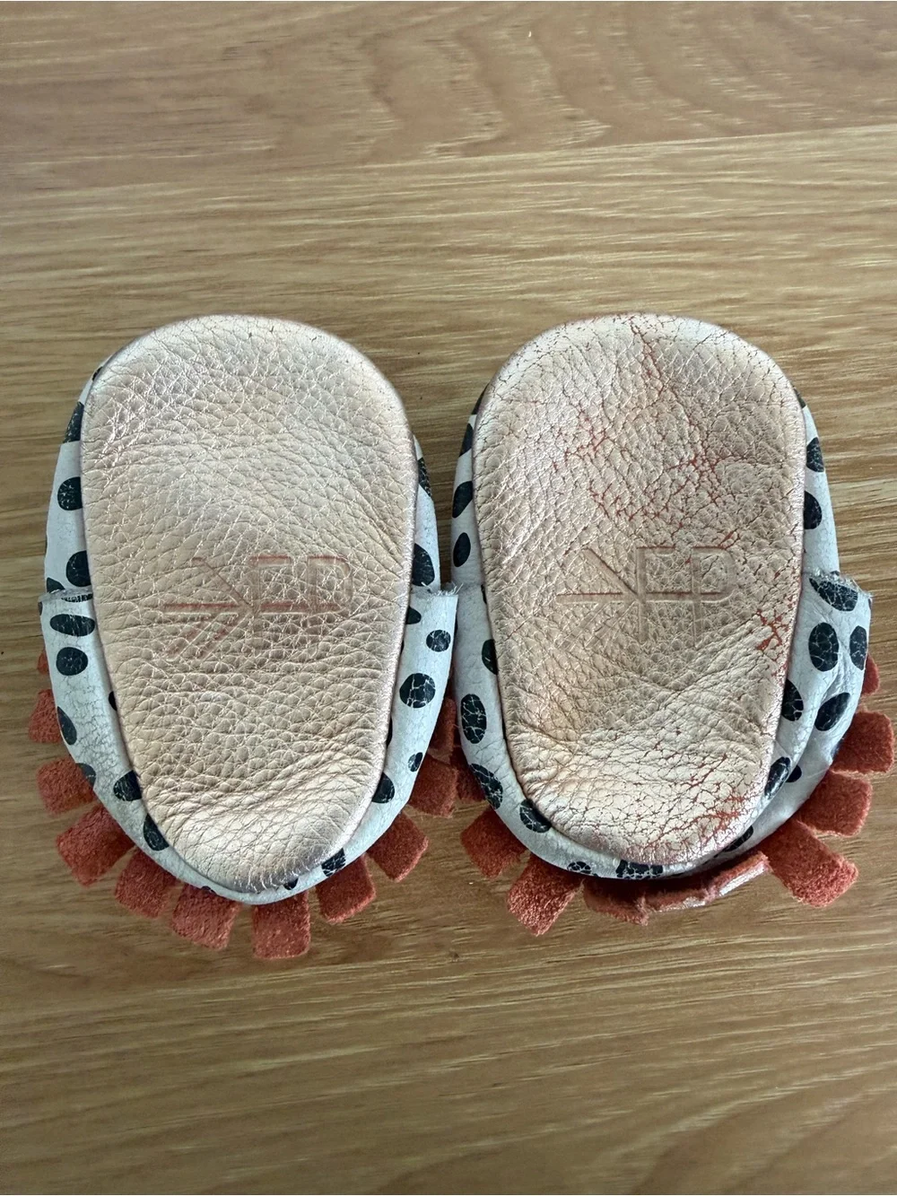 Kids Leather Moccasin Shoes in White with Black Spots and Rose Gold Trim
